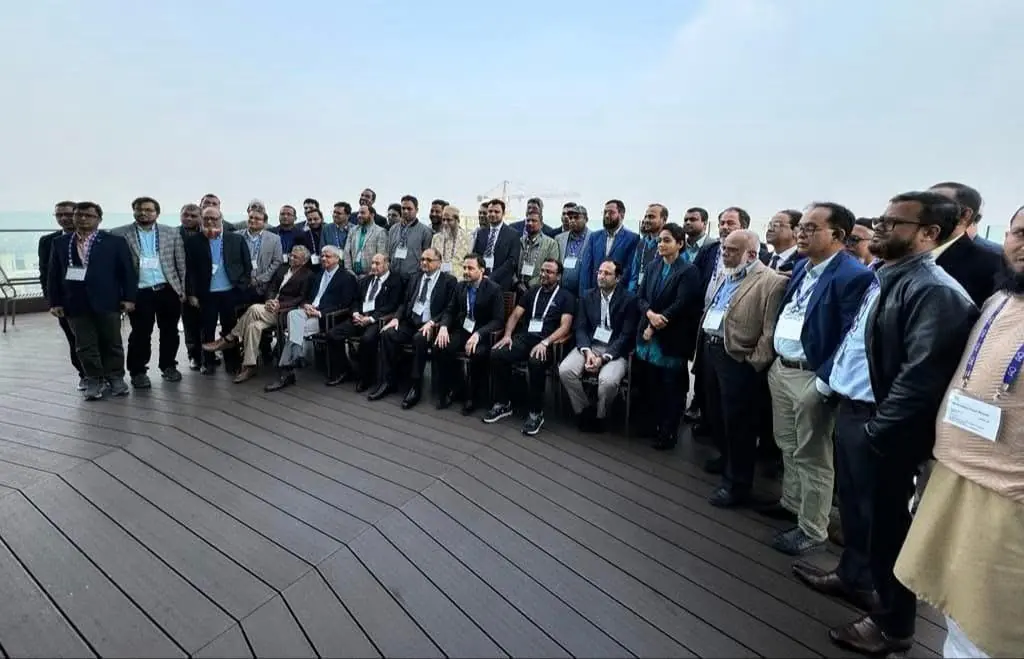 Dr Najmul Hasan with surgical colleagues at a professional medical meeting